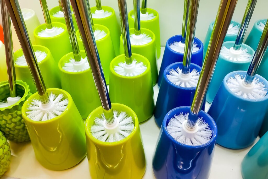 image of colorful toilet brushes