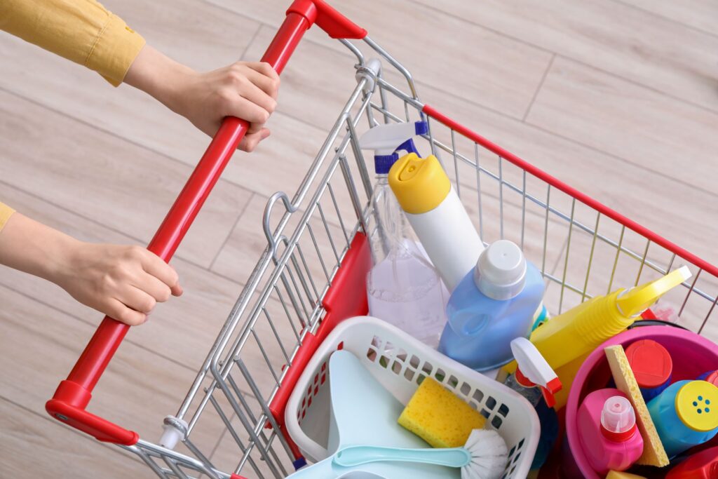 image of a shopping cart full of cleaning supplies