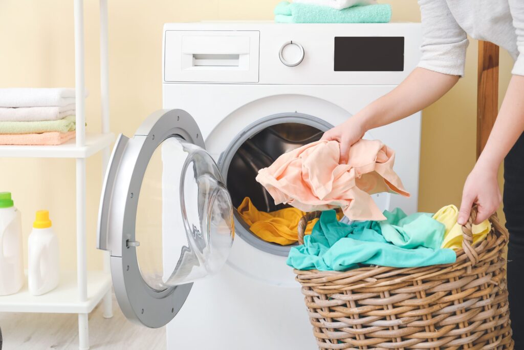 image of a woman doing laundry