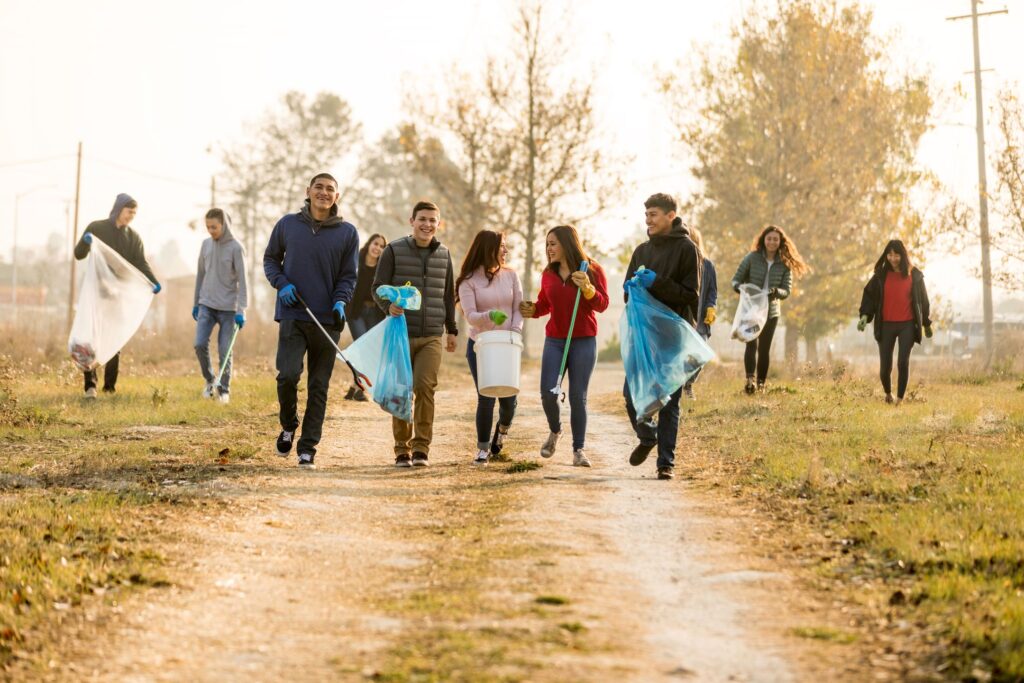 A group of people cleaning up the neighborhood