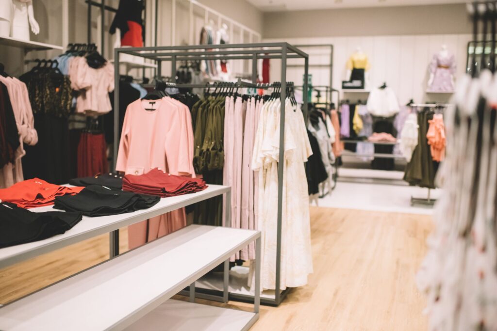 image of clothing racks in a store