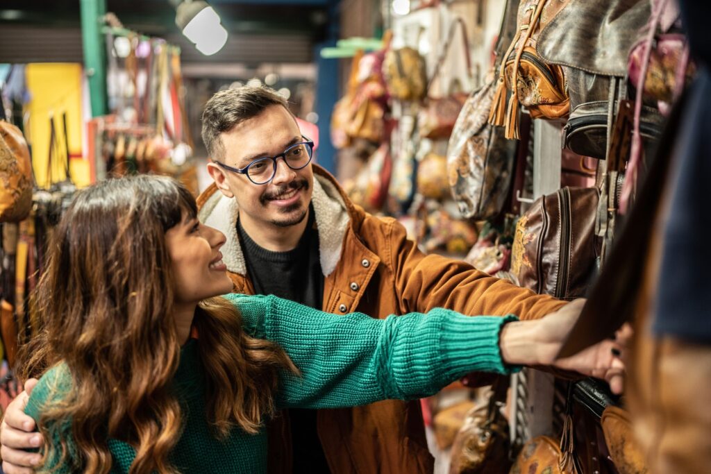 image of a man and a woman shopping in a thrift store